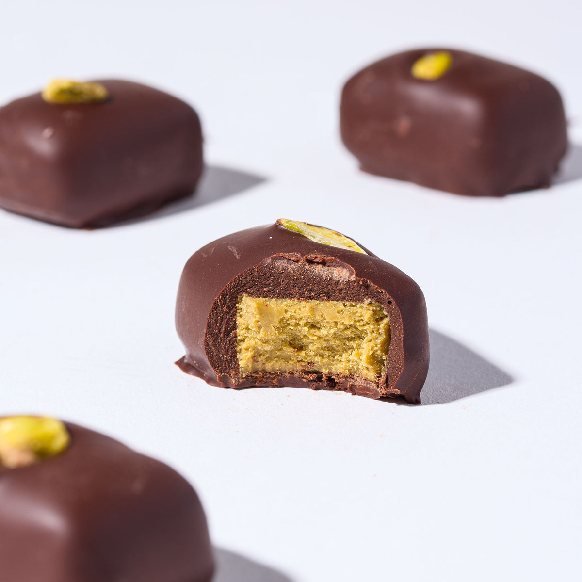 Pistachio Truffle Gift Set by FINE & RAW organic bean to bar chocolate, styled product photo