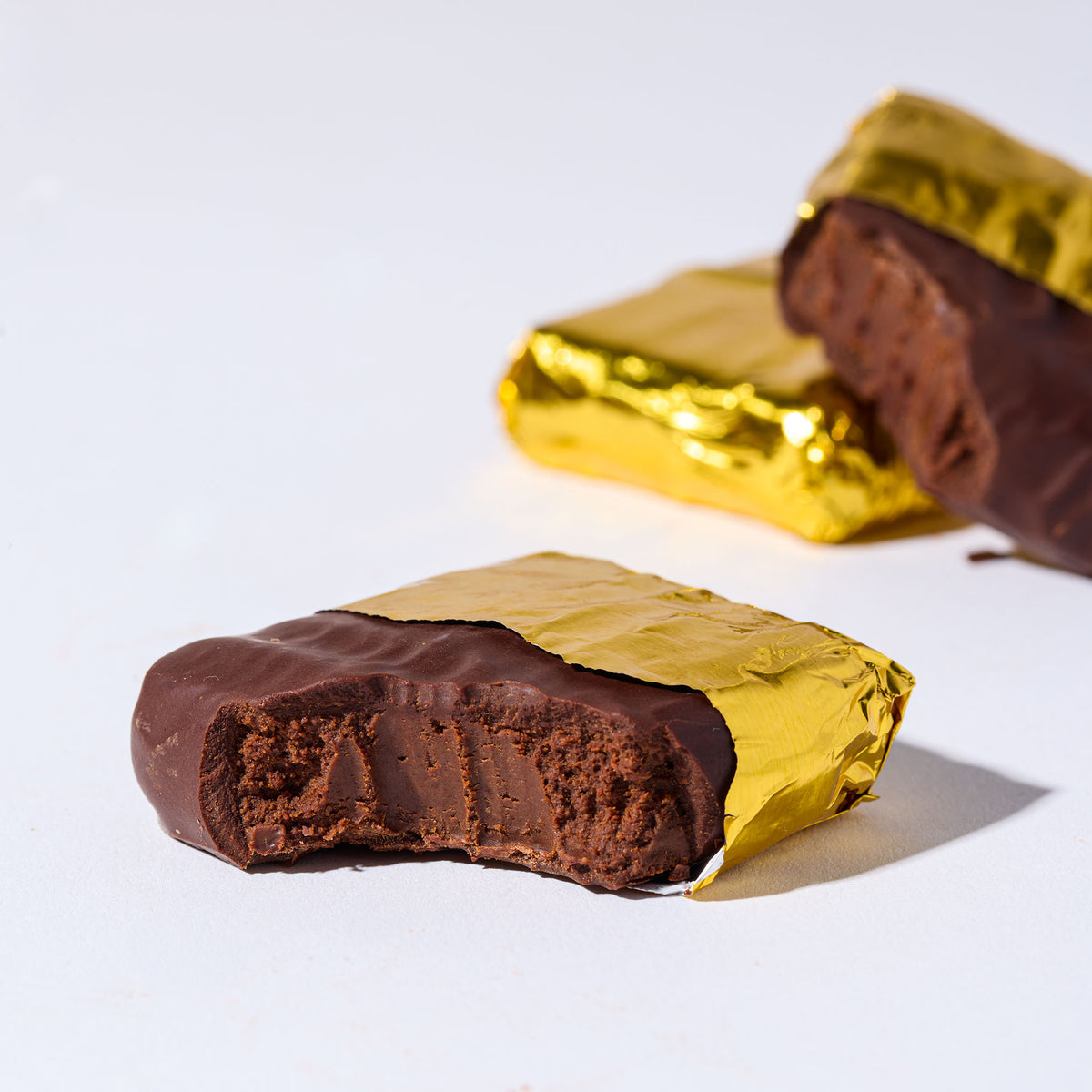 Hazelnut Chunkette by FINE & RAW organic bean to bar chocolate, styled product photo