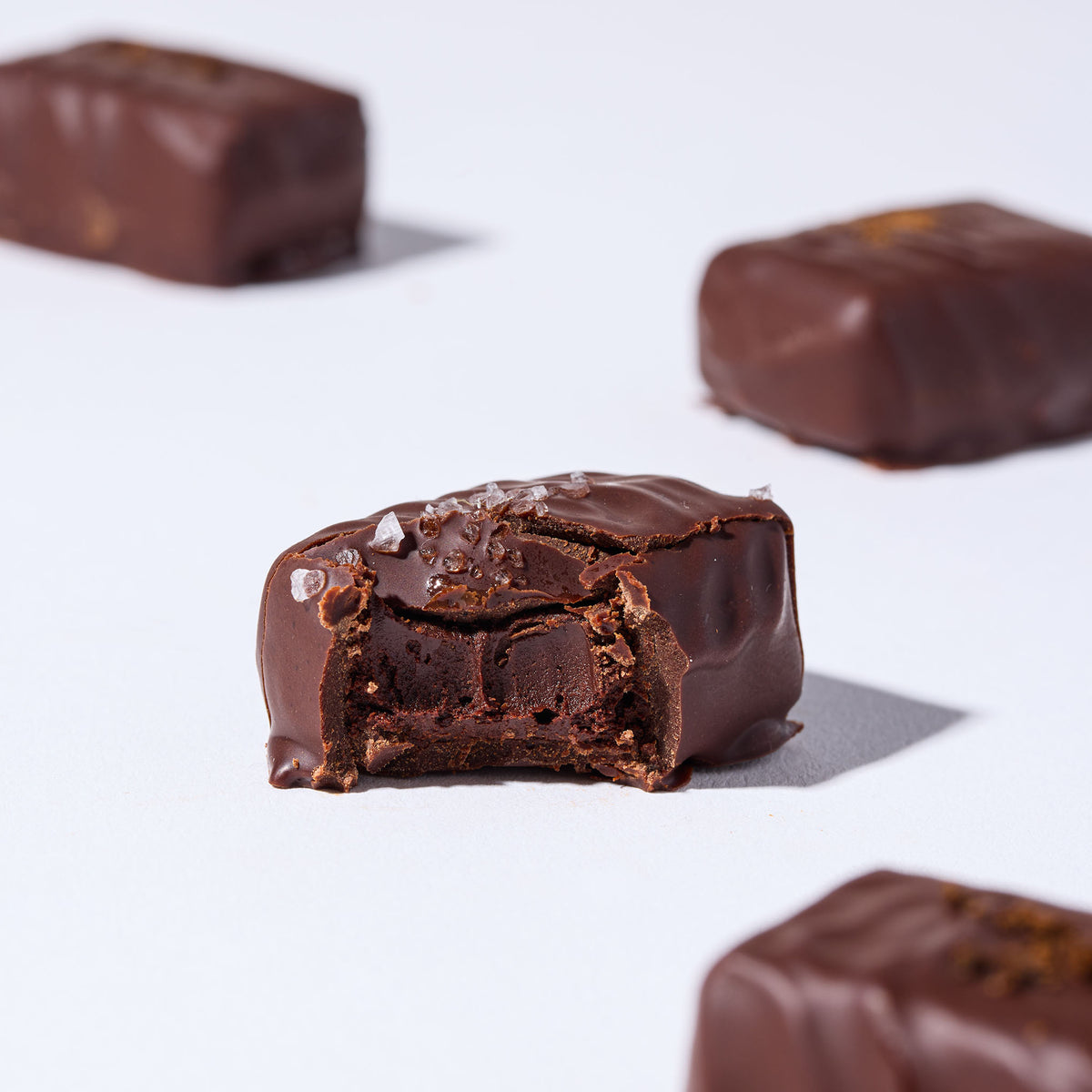 Truffle Gift Set - 8 Piece Mixed by FINE & RAW organic bean to bar chocolate, styled product photo