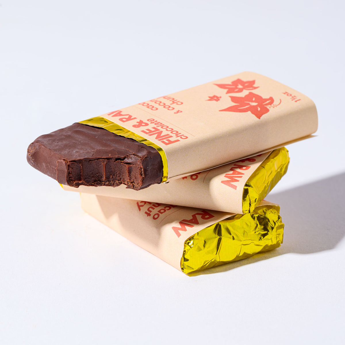 Cacao and Coconut Chunky by FINE & RAW organic bean to bar chocolate, styled product photo