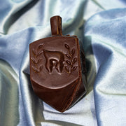 A close up of the chocolate dreidel