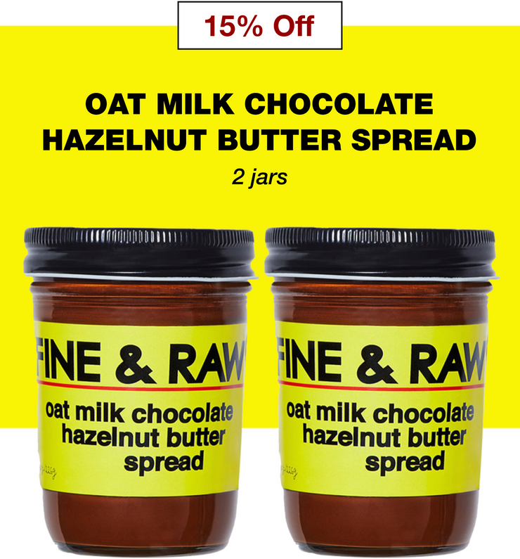 Two jars of Fine & Raw Sweet oat milk chocolate Hazelnut Butter Spread with a label showing the product name and a '15% off' badge.